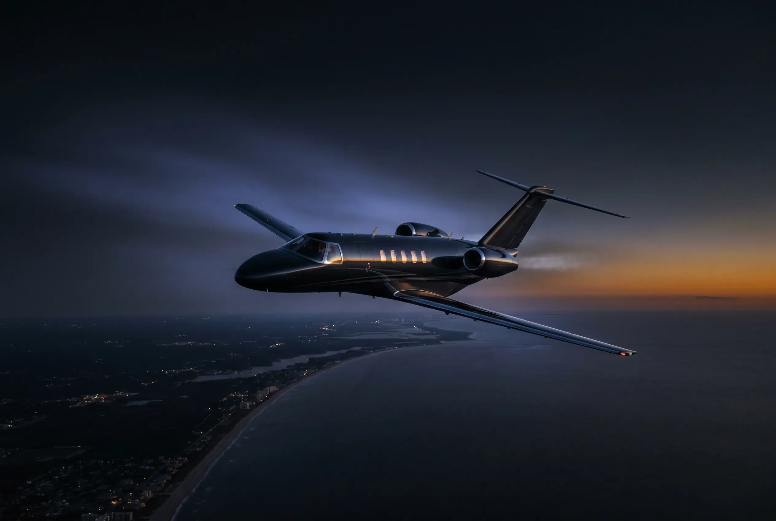 Cessna Citation CJ4 cruising at high altitude over the Atlantic coast at dusk en route from New York to Miami
