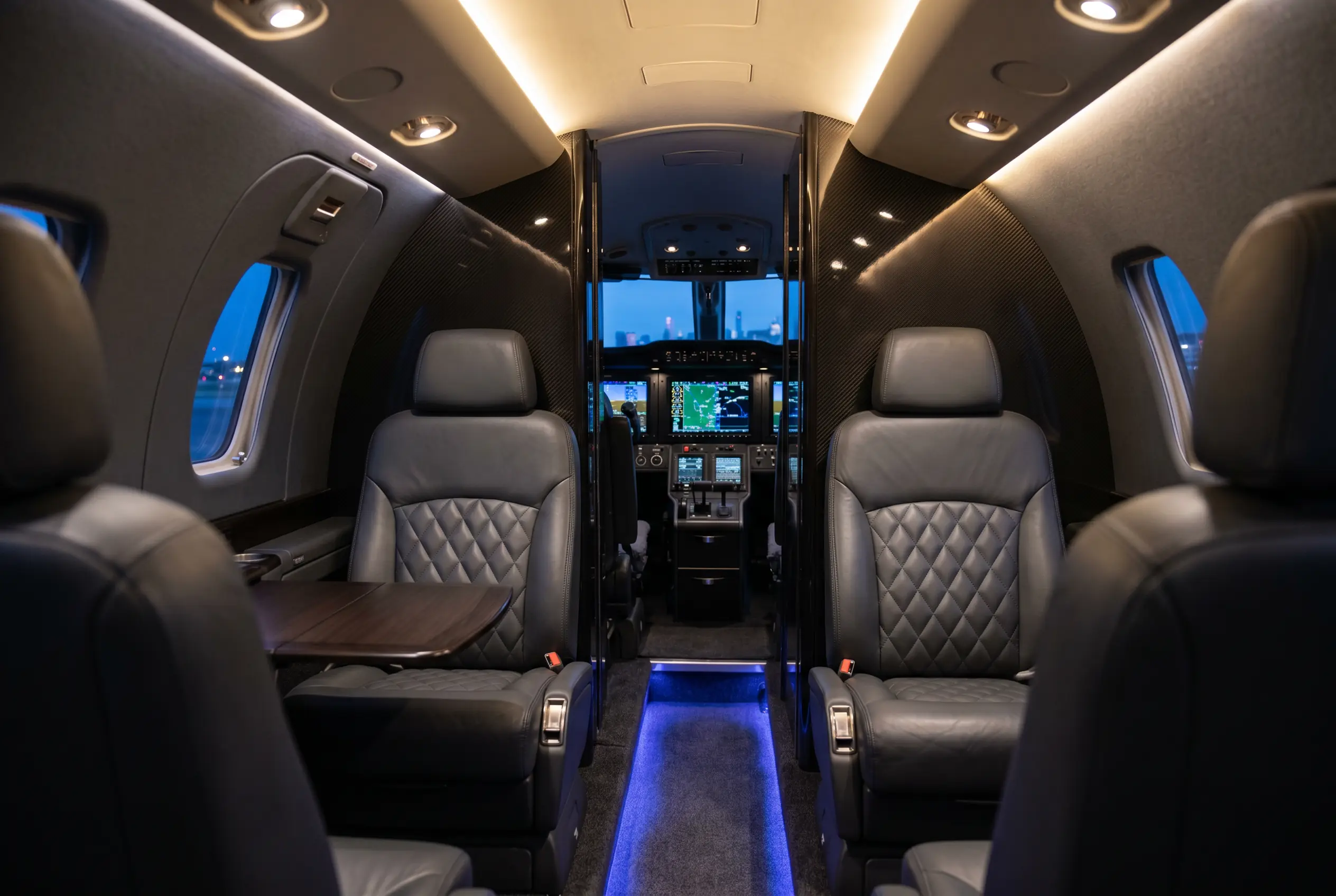 Cessna Citation M2 Garmin G3000 glass cockpit illuminated at dusk ahead of a New York to Miami flight