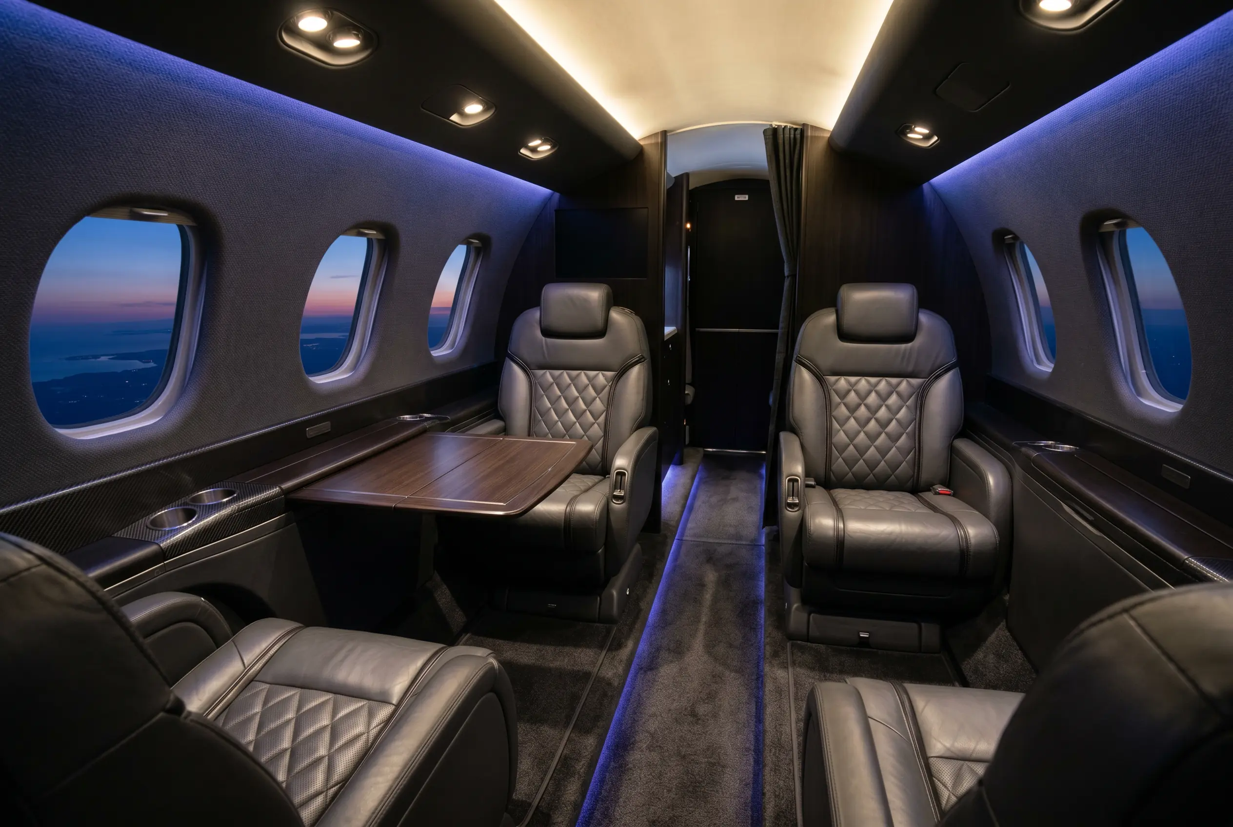 Cessna Citation XLS+ stand-up cabin with club seating for a New York to Miami charter