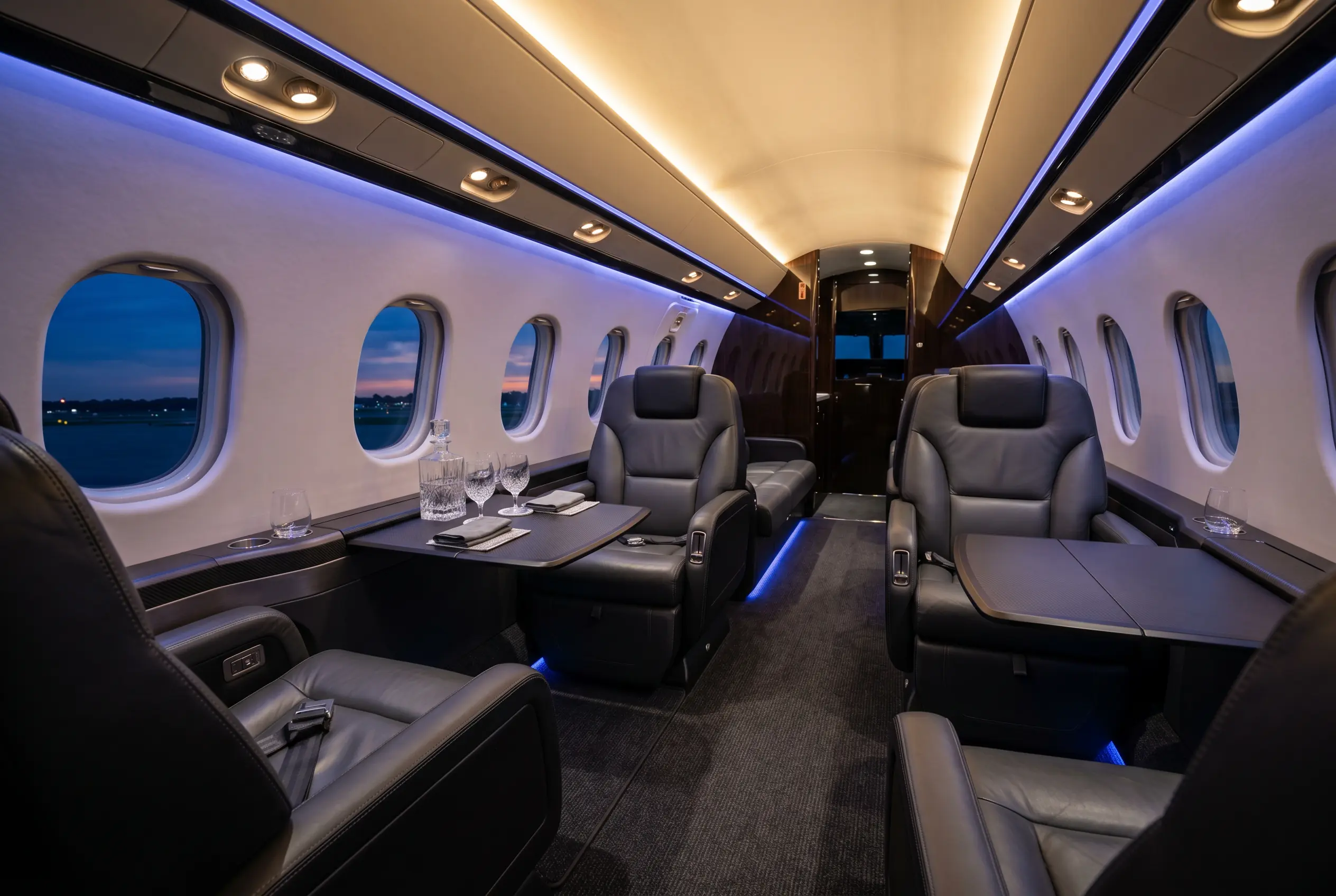 Empty private jet cabin with club seating ready for passengers on a discounted New York to Miami empty leg