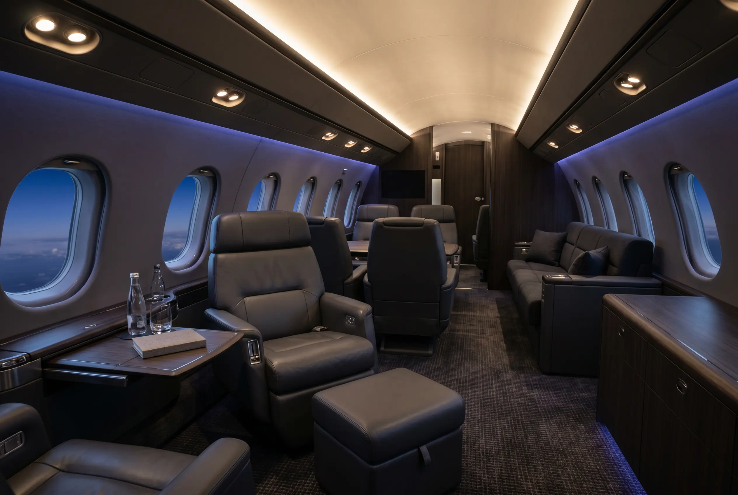 Bombardier Global 6500 large cabin with three living zones and a Nuage seat, configured for a New York to Miami charter