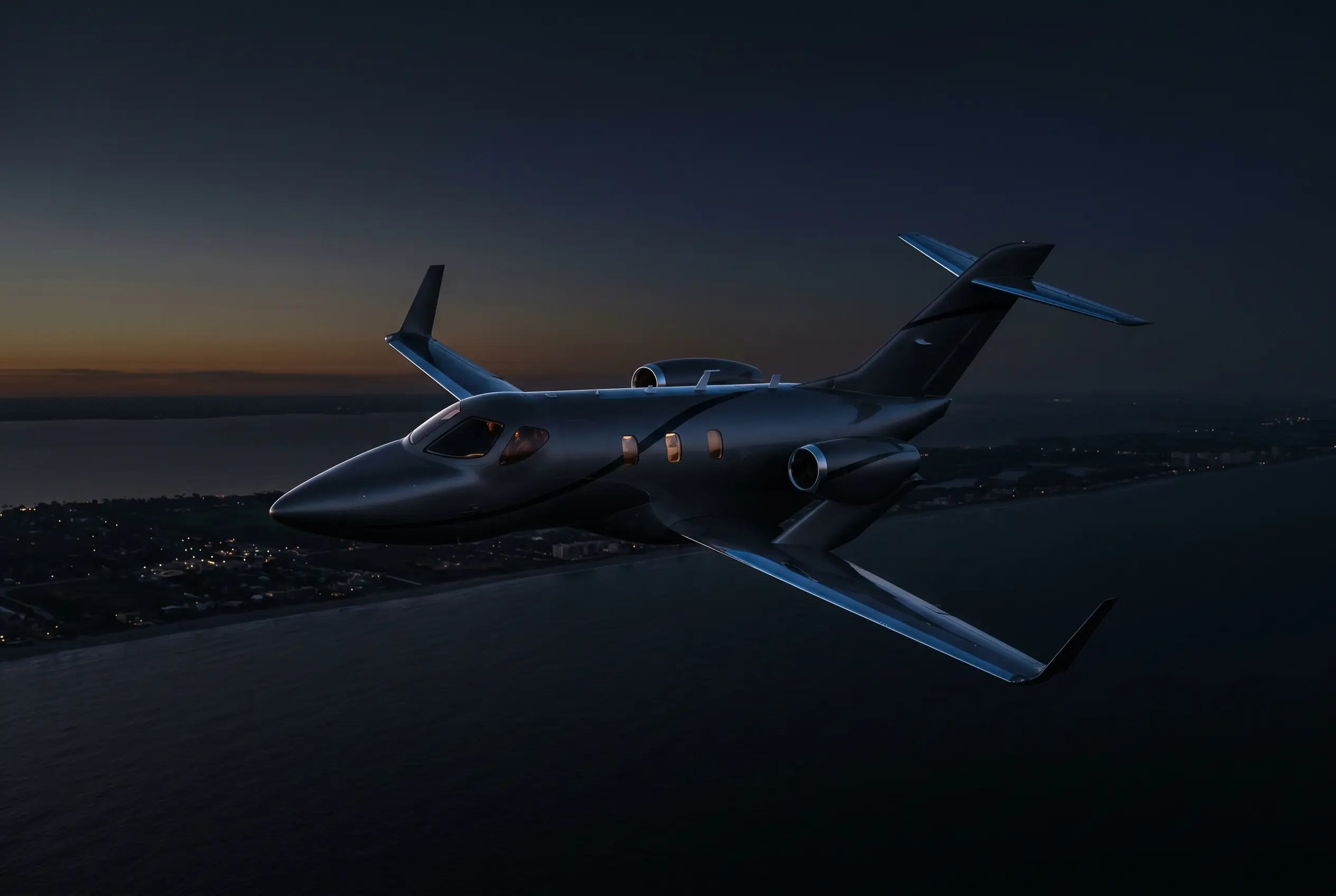HondaJet Elite II cruising at high altitude over the Atlantic coast at dusk en route from New York to Miami