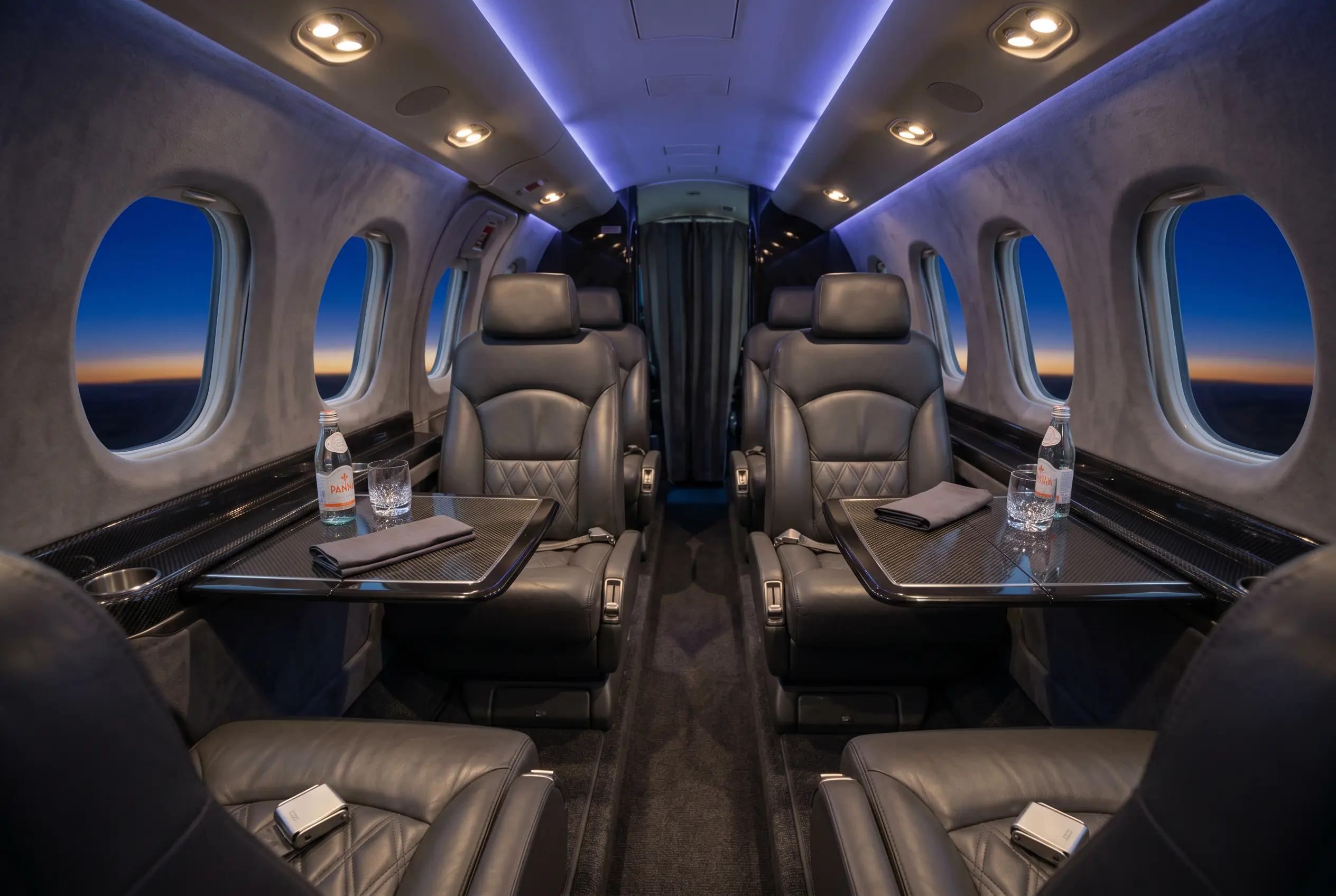 Beechcraft King Air 350 cabin in double-club layout configured for a New York to Miami charter