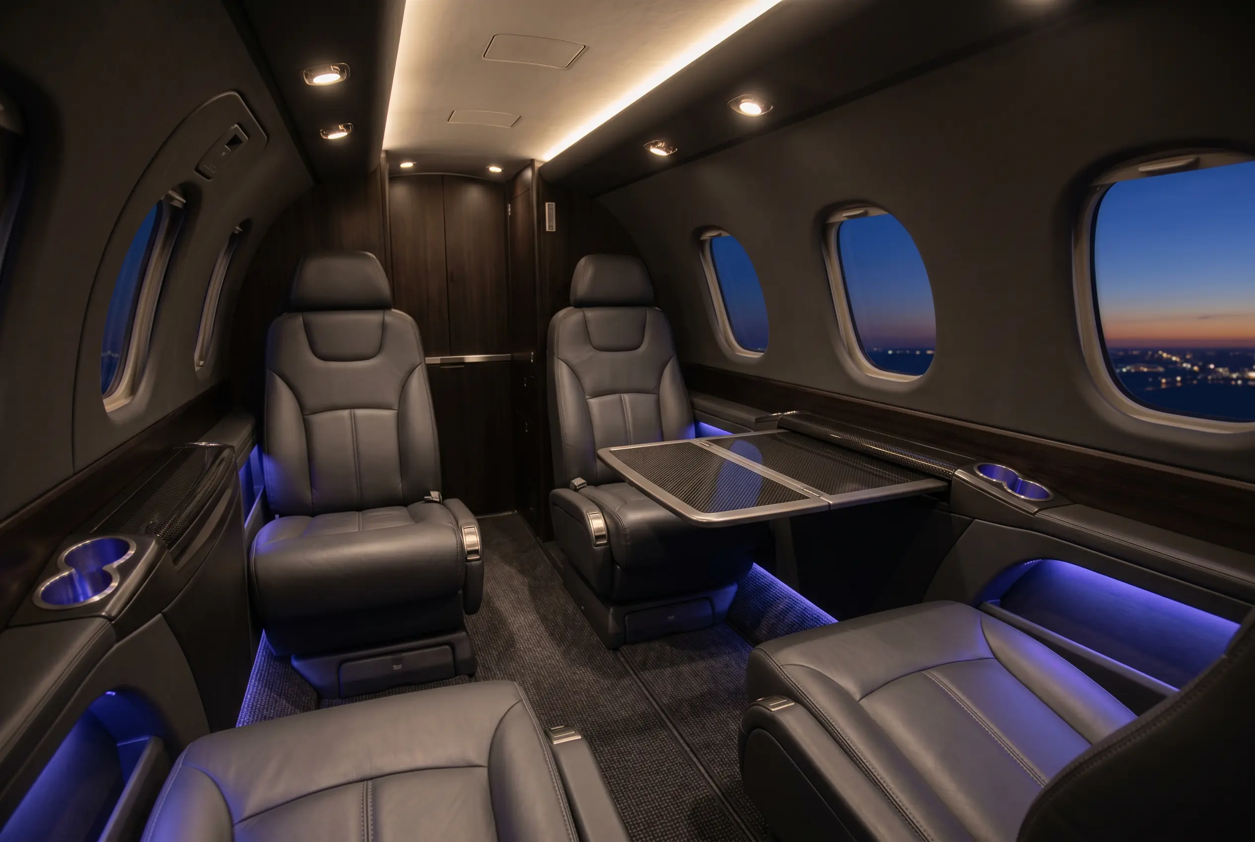 Piper M600/SLS four-seat club cabin with leather seating configured for a New York to Miami charter