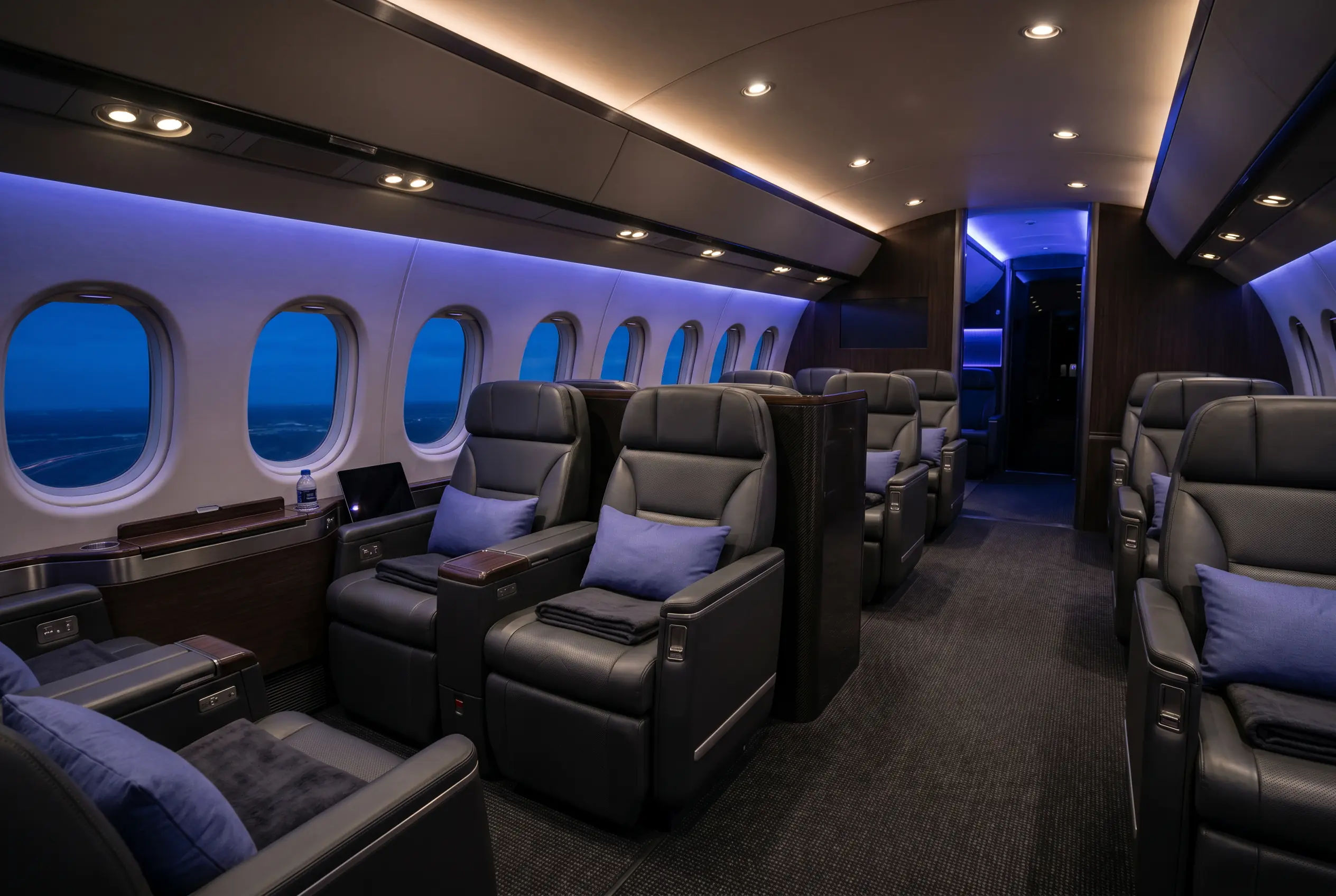 Wide jet cabin configured for a sports team travelling from New York to Miami
