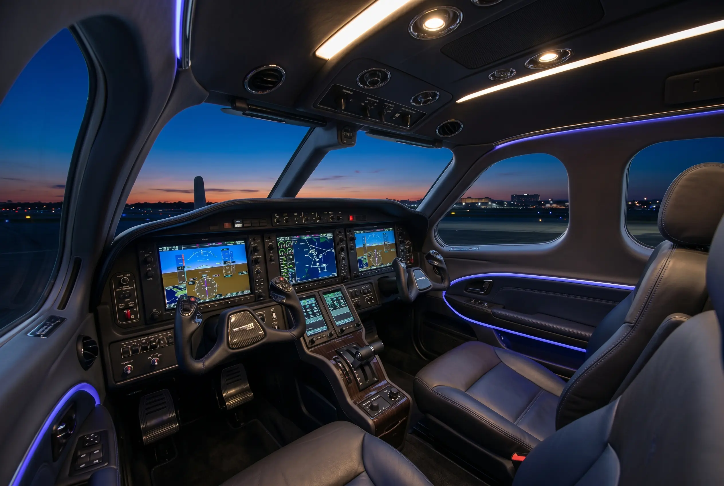 Daher TBM 960 Garmin G3000 glass cockpit illuminated at dusk ahead of a New York to Miami flight