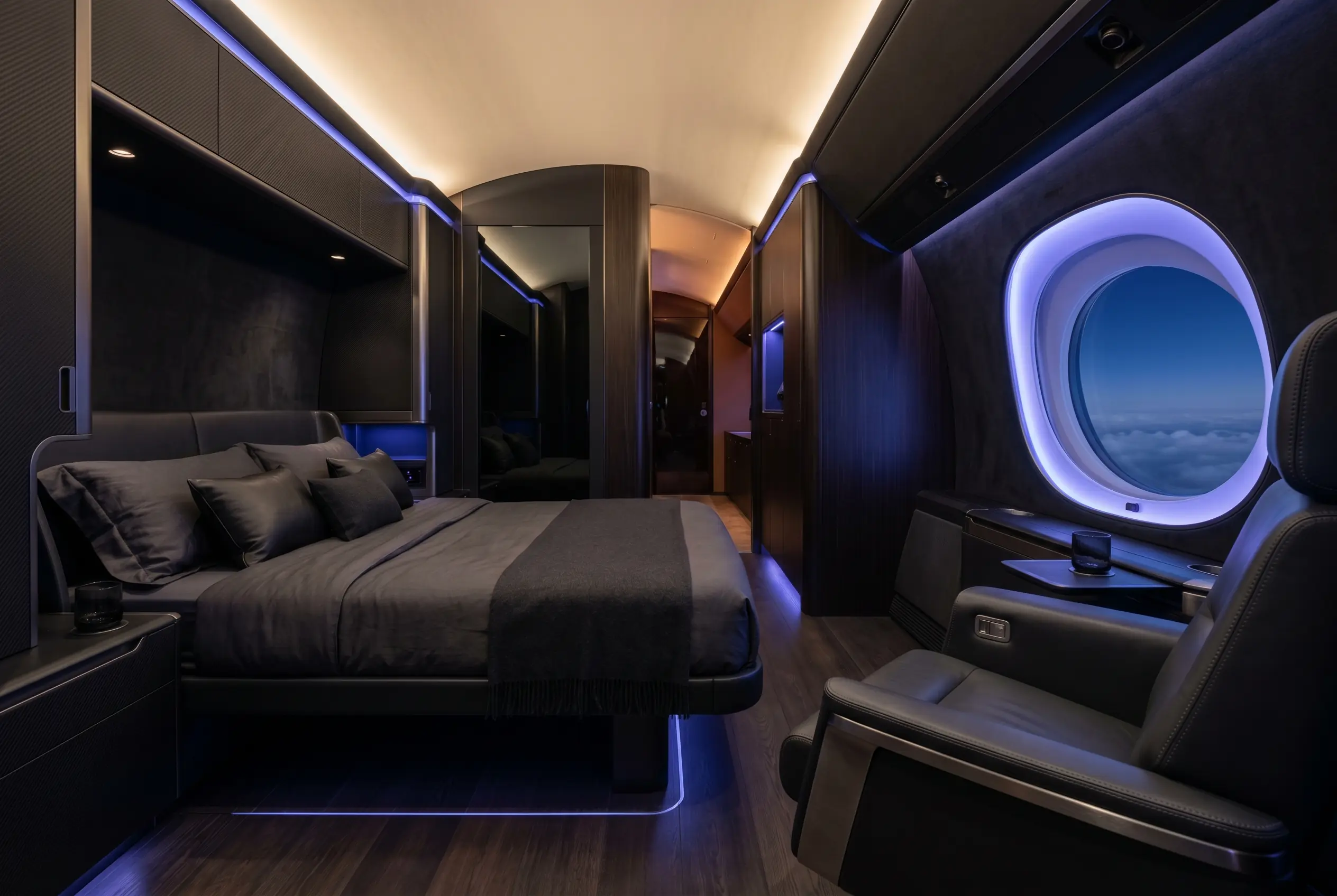 Private aft stateroom in an ultra-long-range jet during a New York to Miami flight