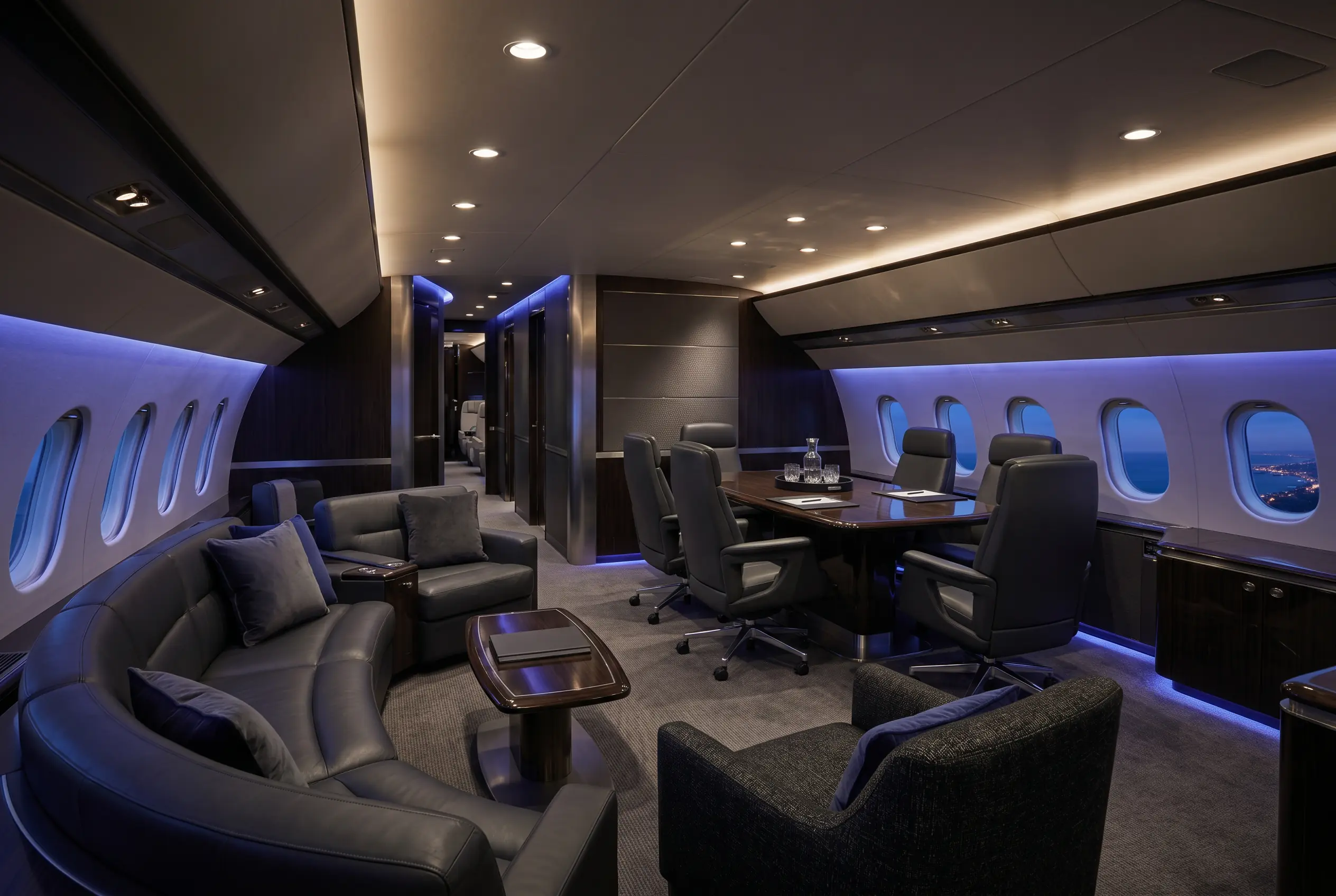 Spacious VIP airliner lounge with sofas and a conference area for a New York to Miami charter